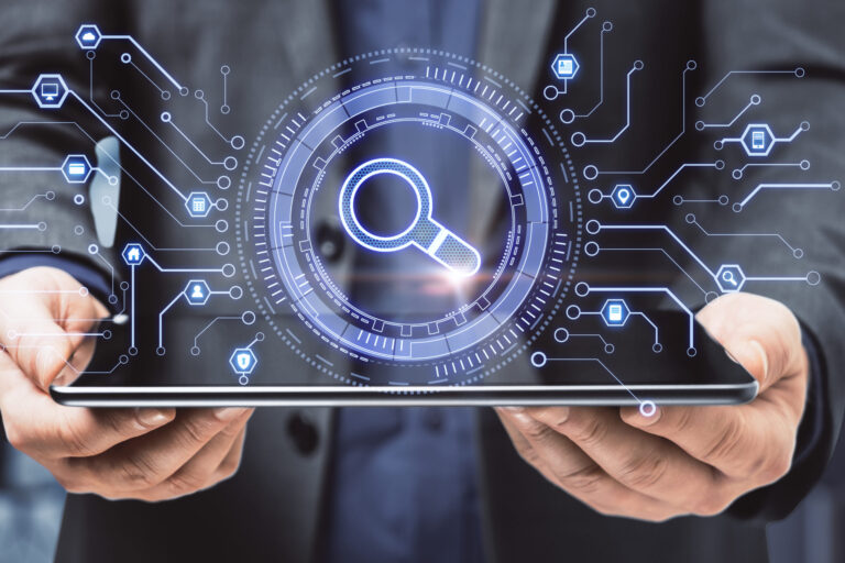 A person in a suit holds a tablet with a digital magnifying glass icon and circuit lines, symbolizing AI search technology and data analysis.