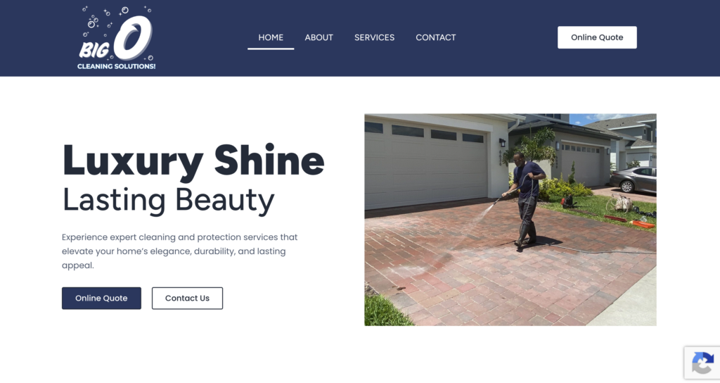 A person uses a power washer to clean a brick driveway in front of a house. The website header reads, “BIG O Cleaning Solutions,” with navigation links, service descriptions, and highlights from the company’s Website Design Portfolio.